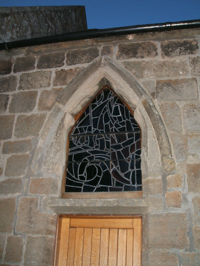 Photo of the head of a medieval window