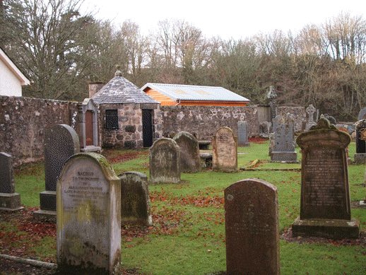 Photo of the churchyard at Edinkillie showing the Watch House.