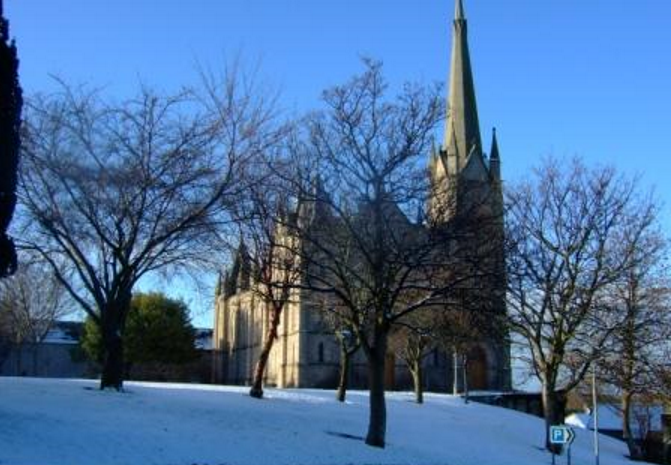 Picture of the modern Parish Church of Forres in the snow.