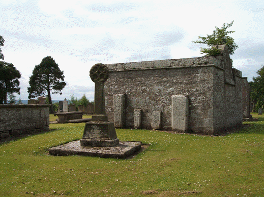 The 'Cathedral Cross' and the Leslie Mausoleum in Spynie churchyard.