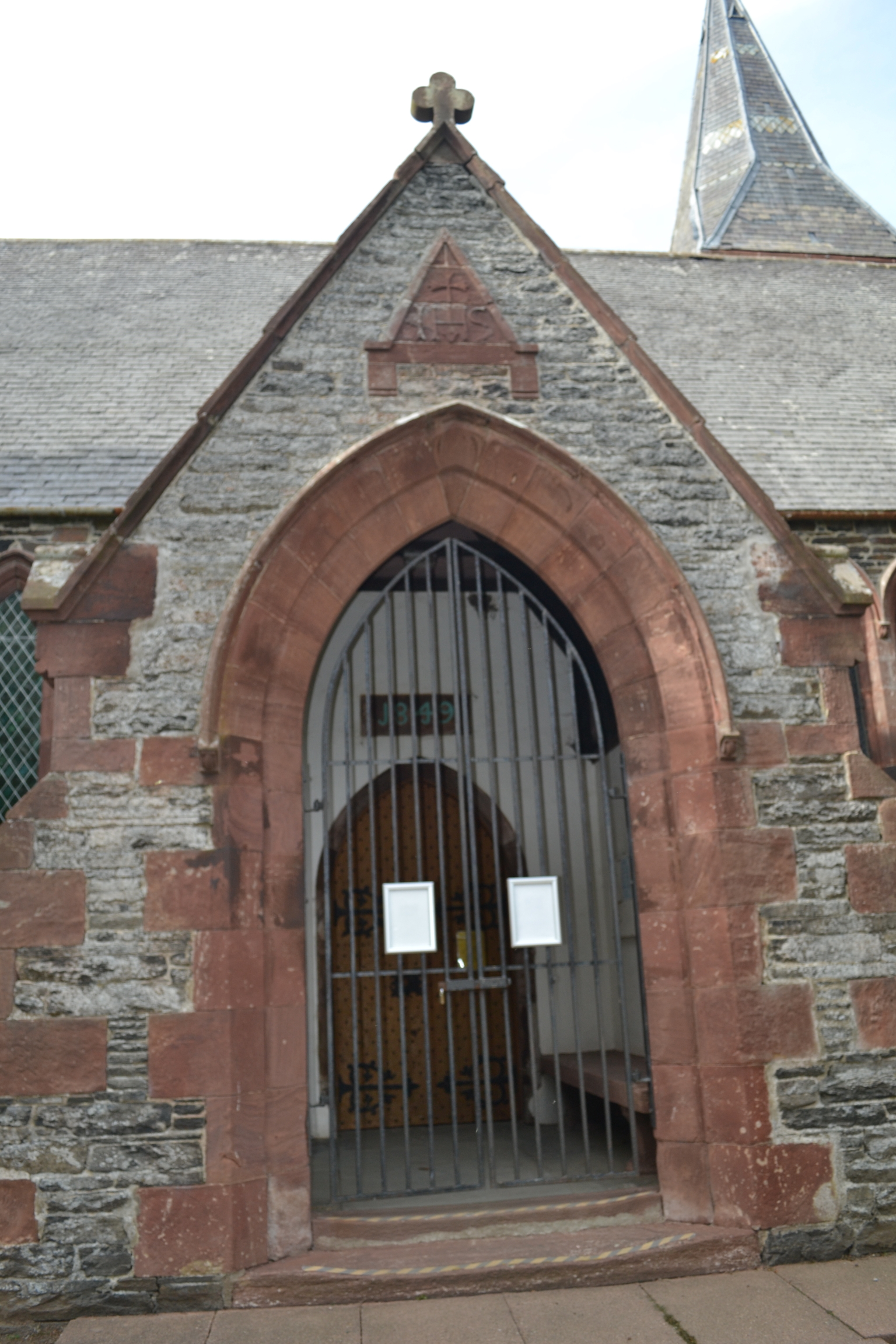 The stone set above the entrance porch of Woodhead Episcopal Church.